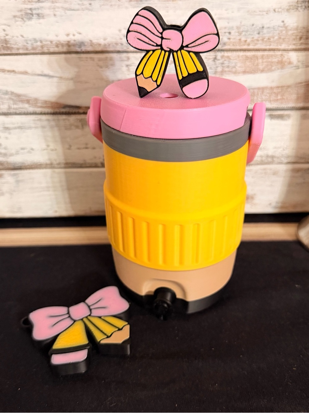 Pencil can koozie with straw topper and can opener